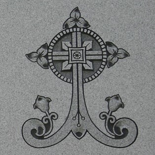 Memorial monument - Circled cross Memorial monument inscription of a circled cross with trillium flowers